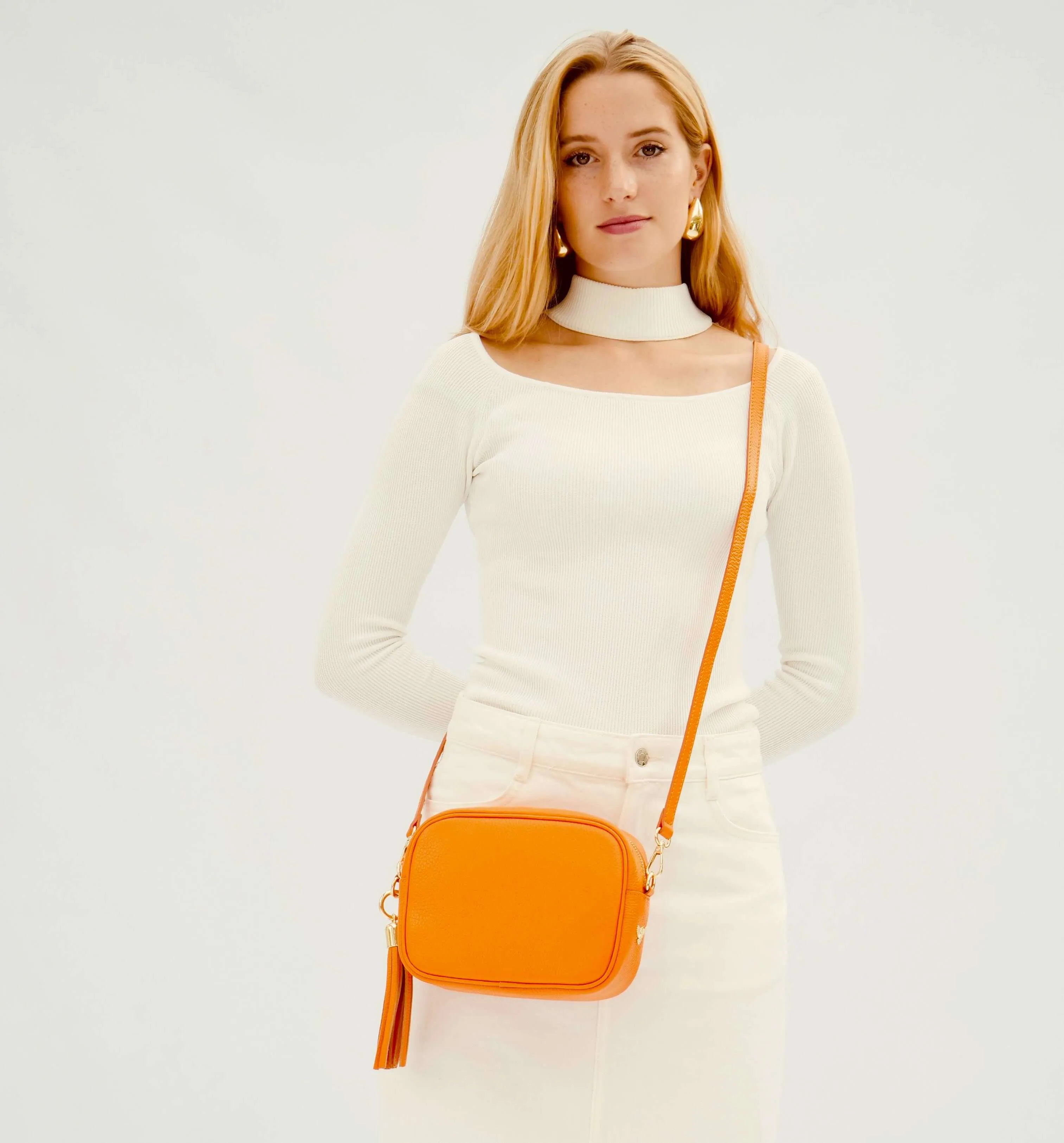 The Tassel Orange Leather Crossbody Bag With Orange & Tan Check Strap