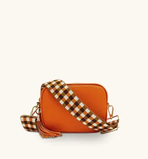 The Tassel Orange Leather Crossbody Bag With Orange & Tan Check Strap