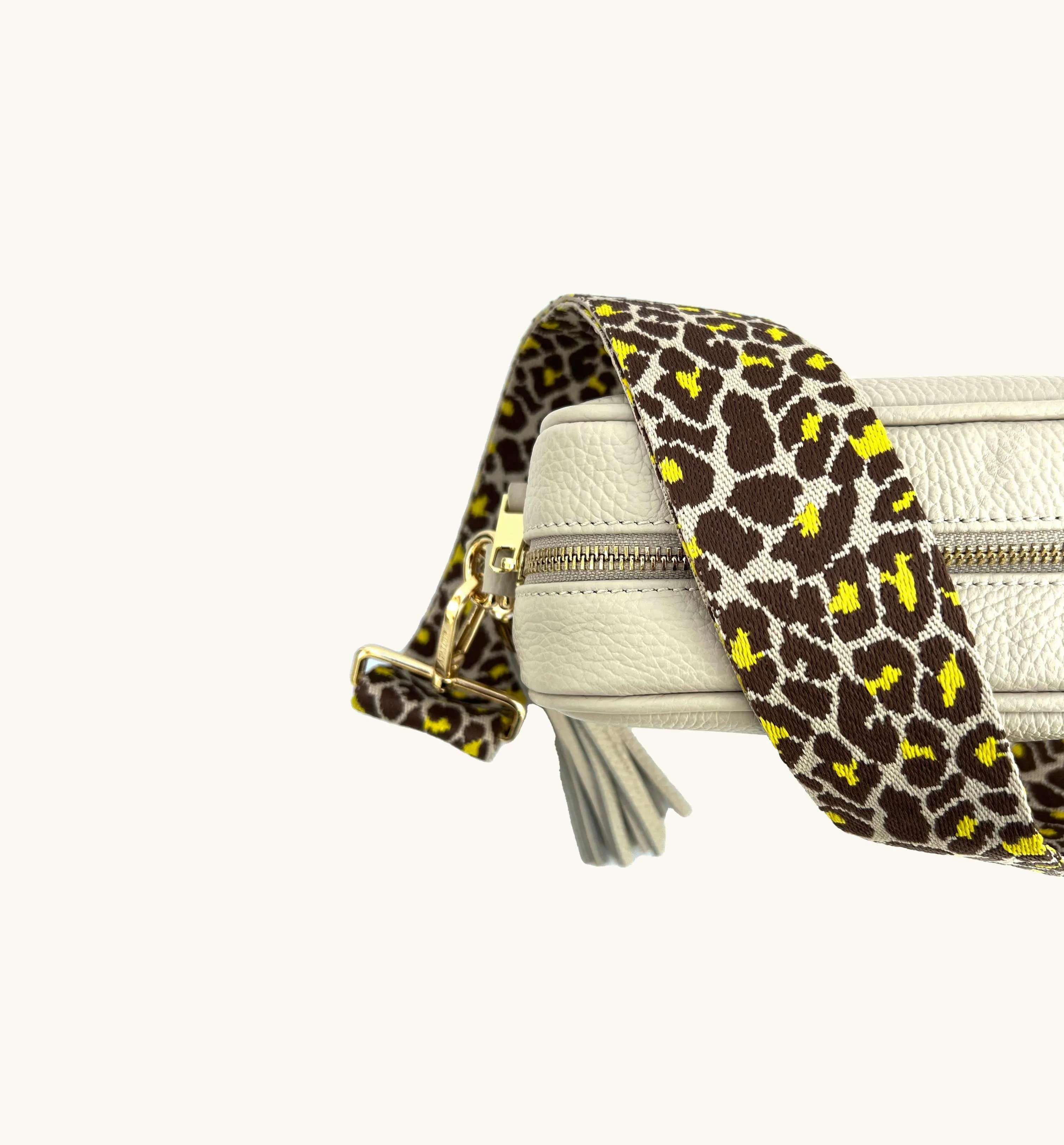 The Tassel Stone Leather Crossbody Bag With Lemon Cheetah Strap