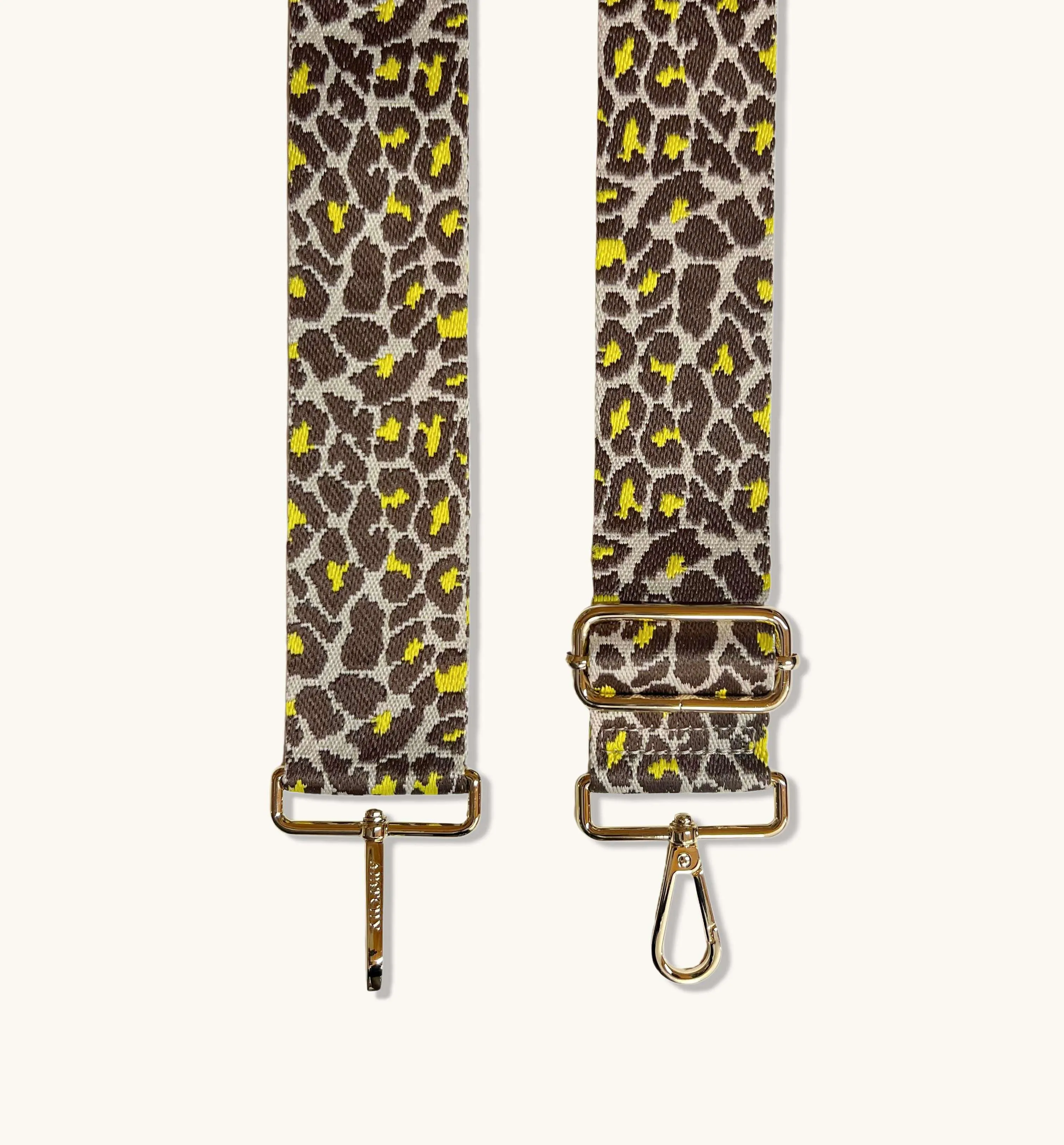 The Tassel Stone Leather Crossbody Bag With Lemon Cheetah Strap